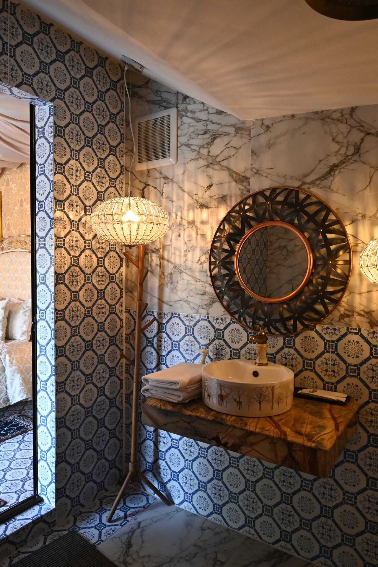 Warm LED strip lighting glowing under a modern bathroom vanity