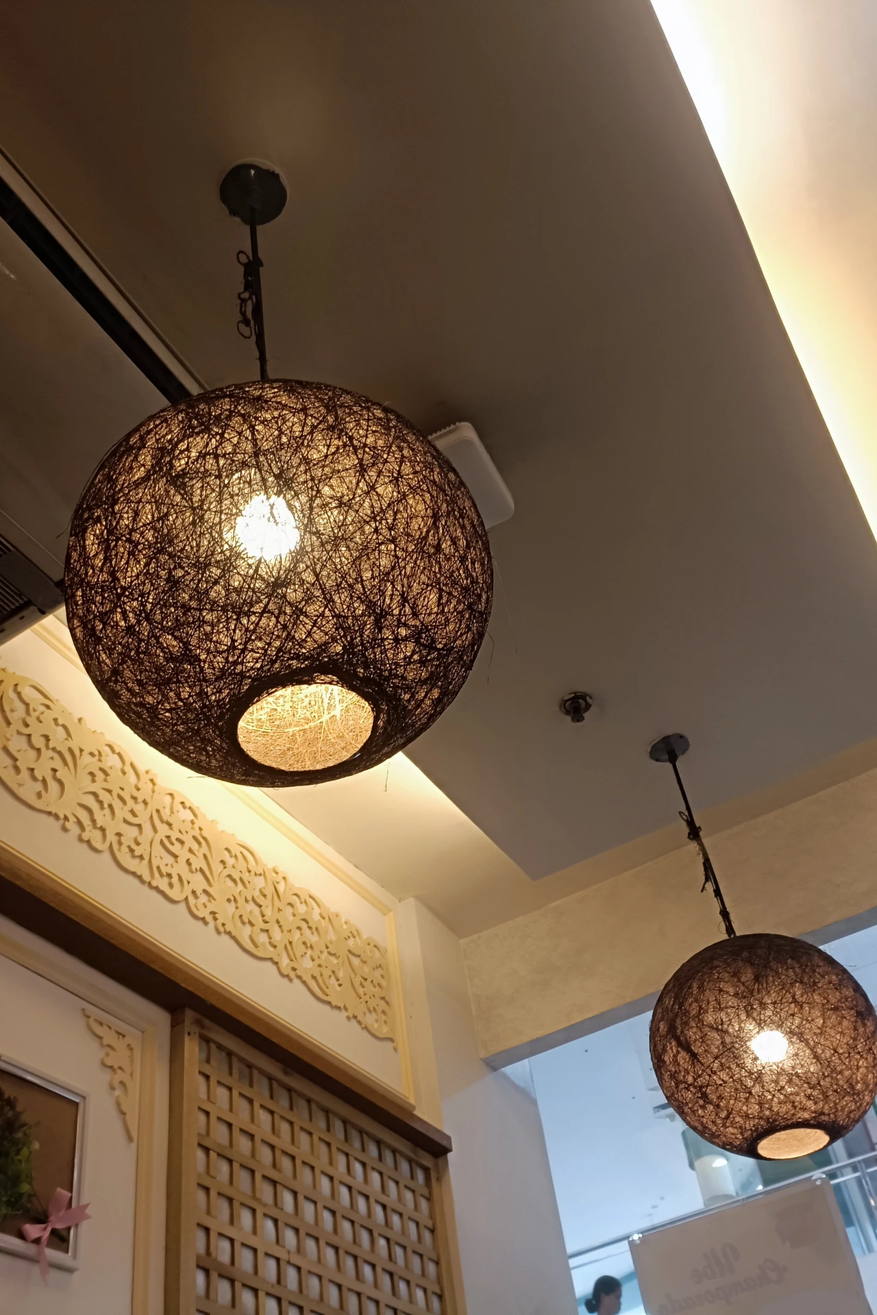 Modern pendant light hanging in a stylish bathroom