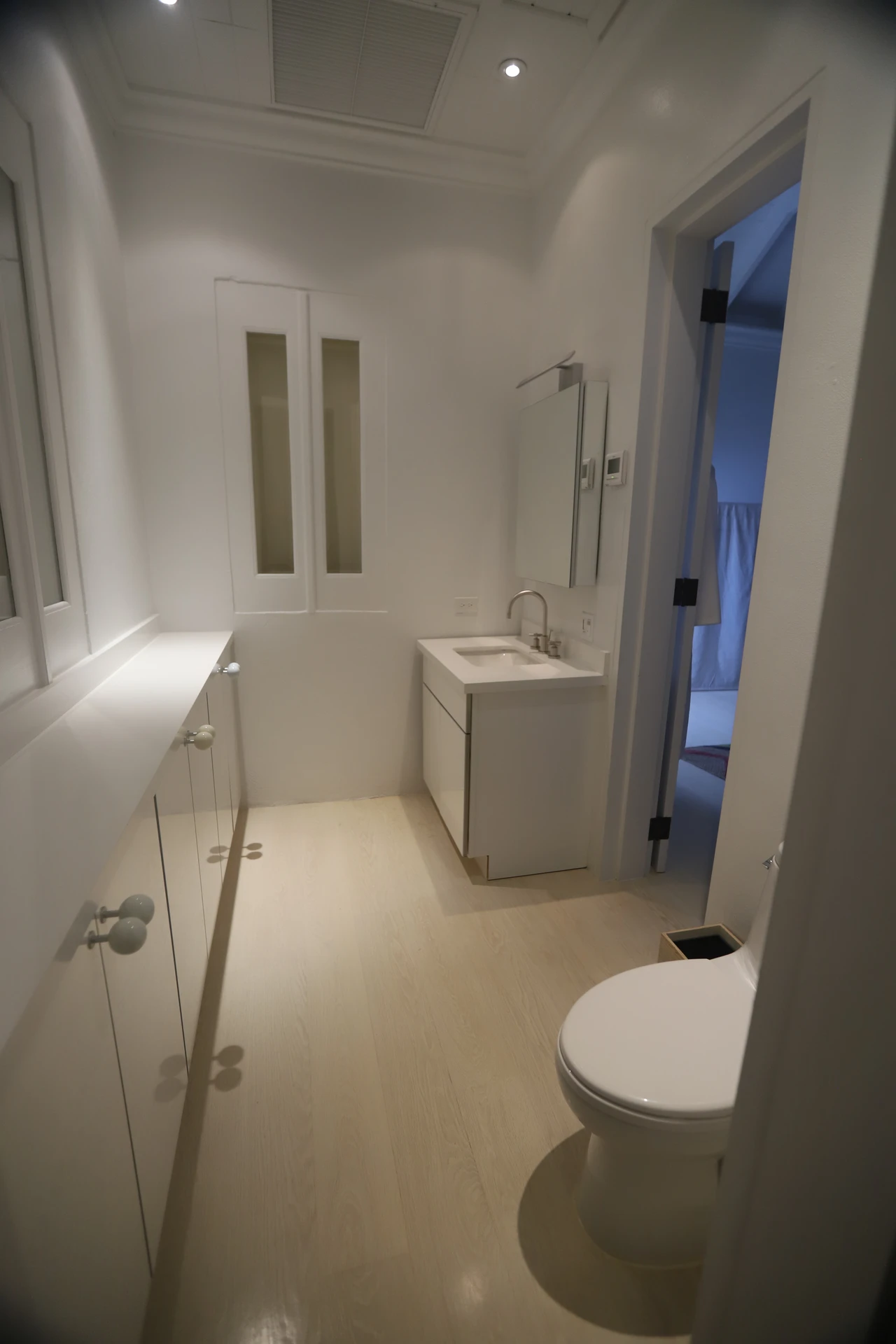 Soft-close toilet seat on a modern white toilet