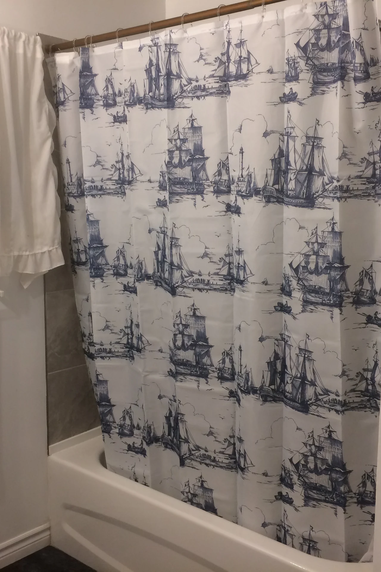 Sage Green Curtain for a Spa Mood in a cozy budget bathroom with soft natural light