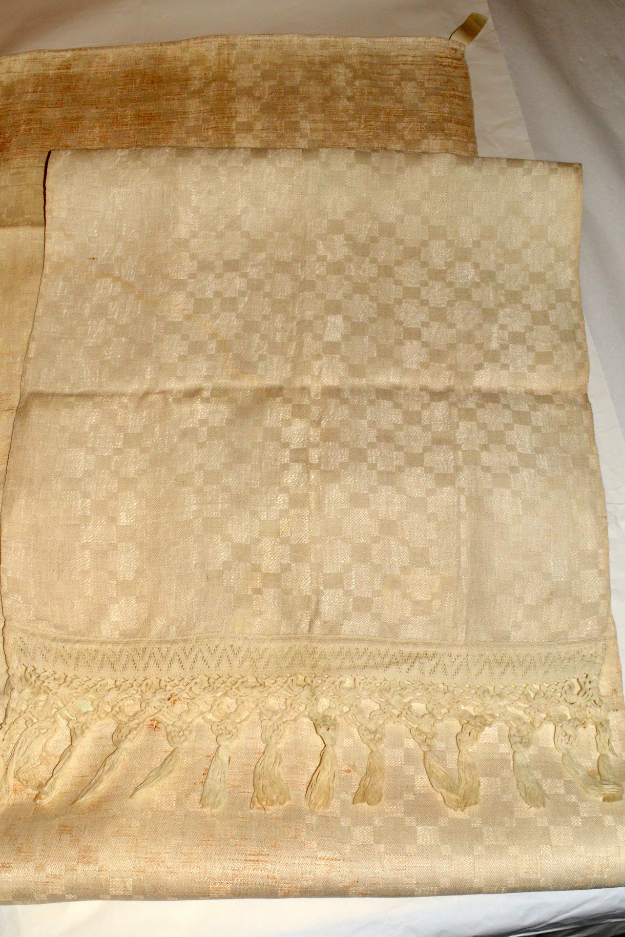 Textured Tassel Trim for a Handmade Feel in a cozy budget bathroom with soft natural light