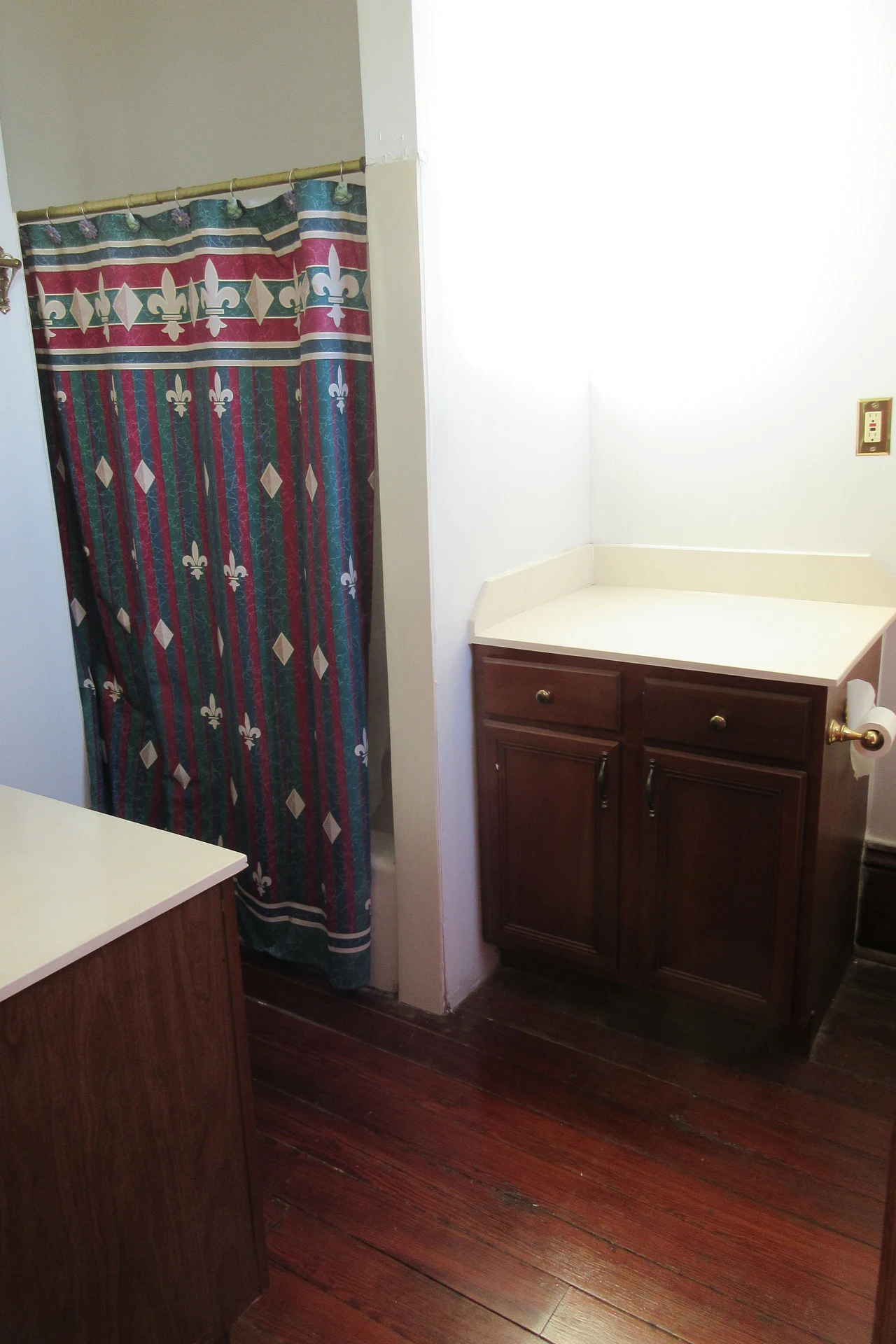 Charcoal Curtain That Hides Water Marks in a cozy budget bathroom with soft natural light