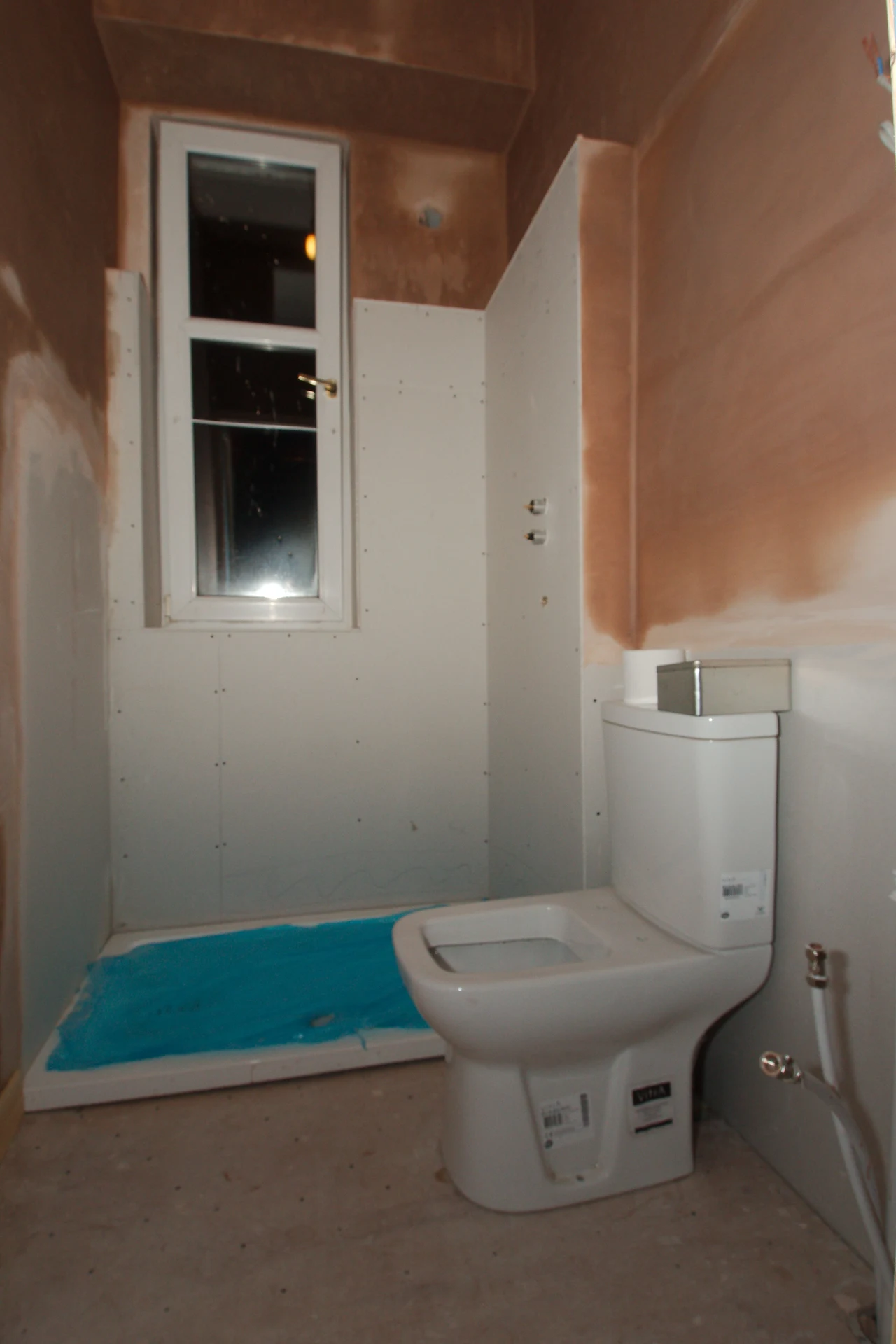 Rust and Cream Curtain for Warm Autumn Tones in a cozy budget bathroom with soft natural light