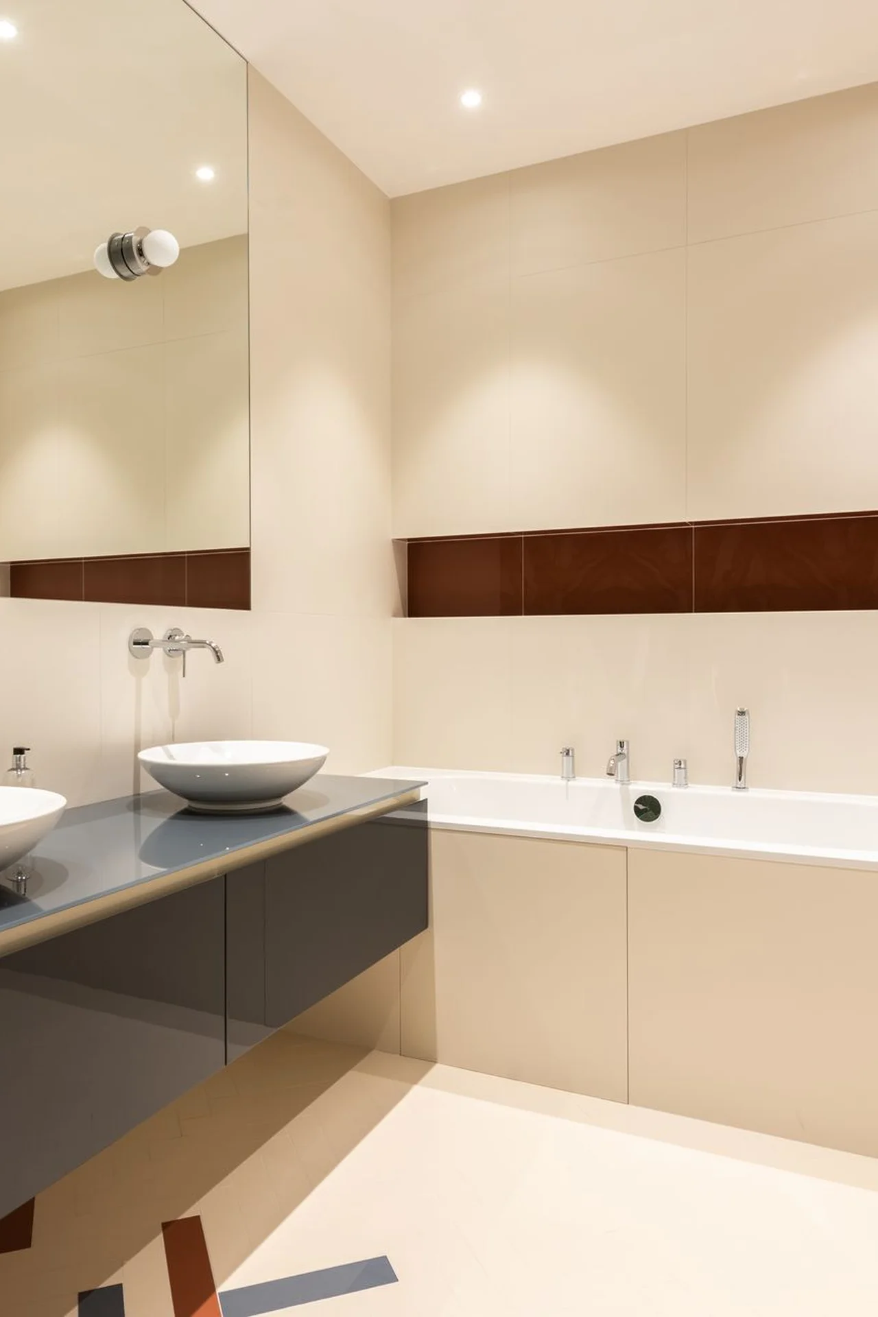 Bright tiny bathroom with light painted walls and white fixtures