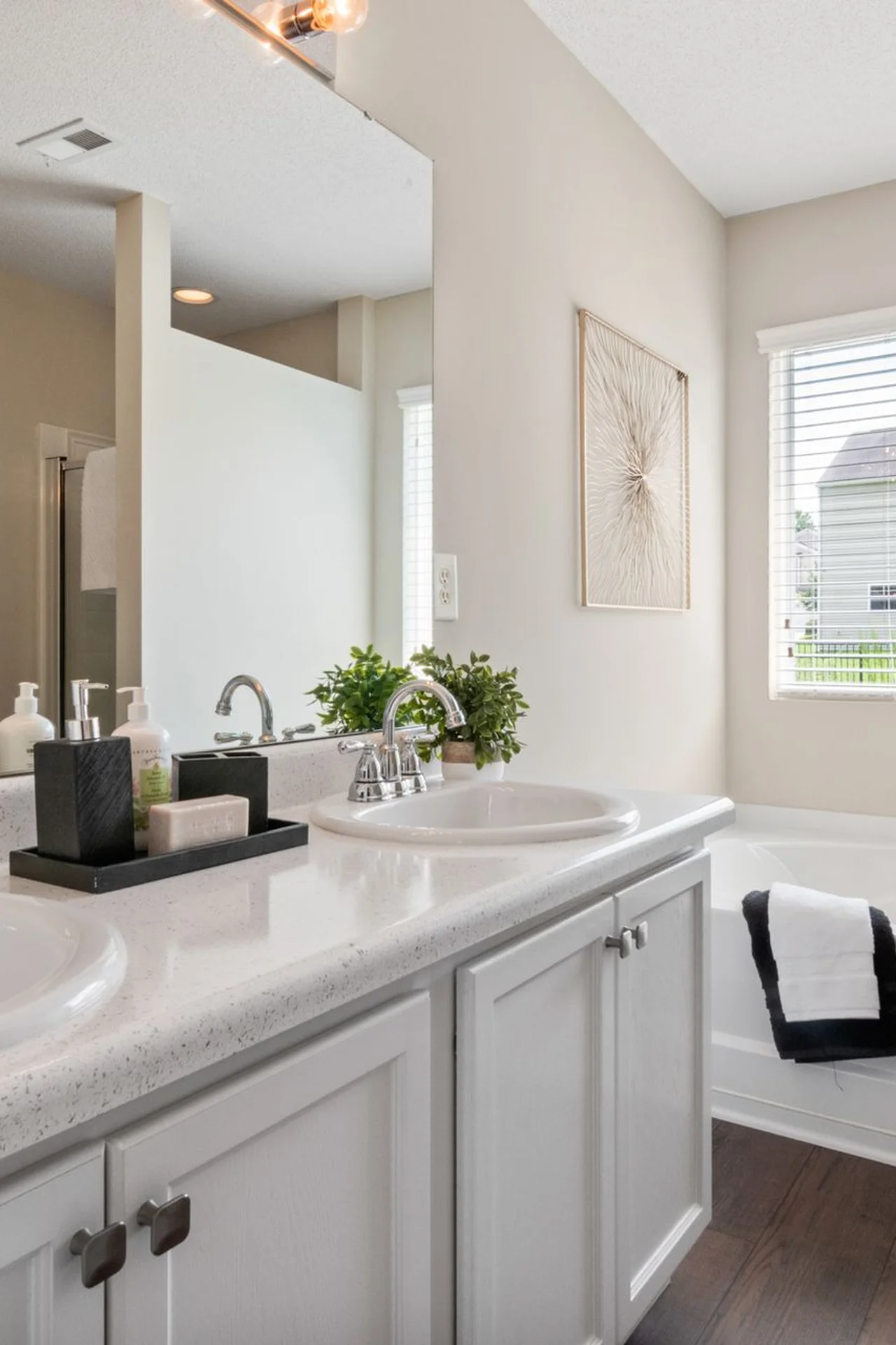 Minimal tidy tiny bathroom with clear surfaces