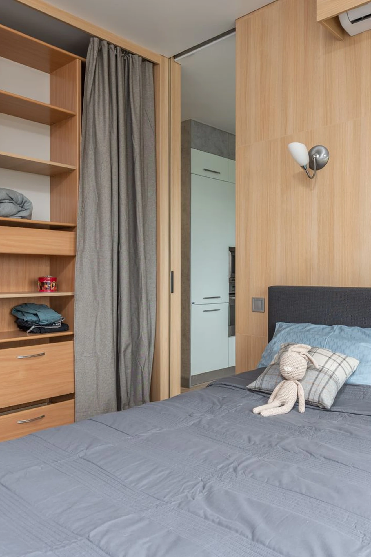 Slide Flat Bins Under the Bed in a small apartment