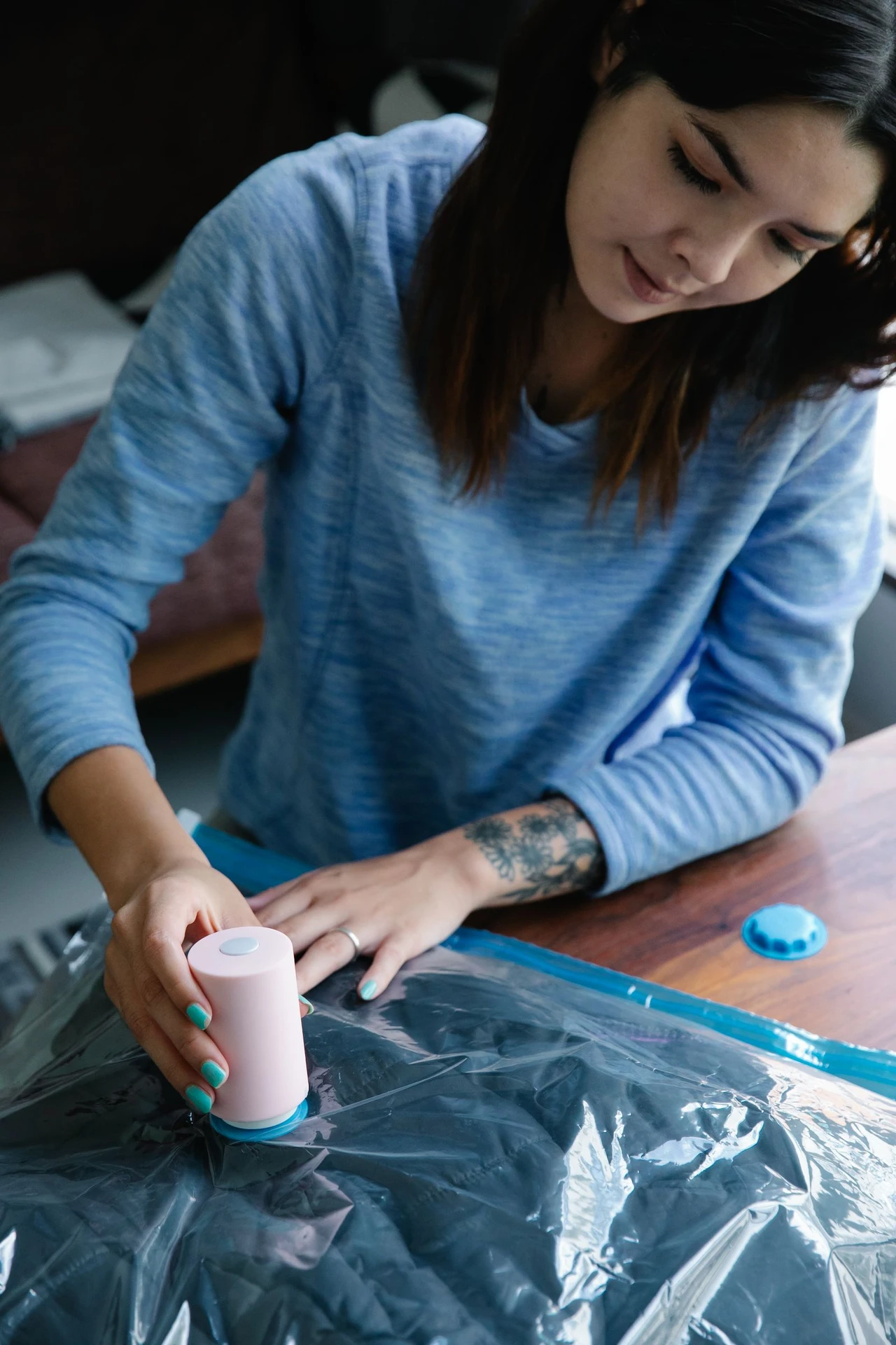Vacuum-Seal Bulky Bedding and Coats in a small apartment