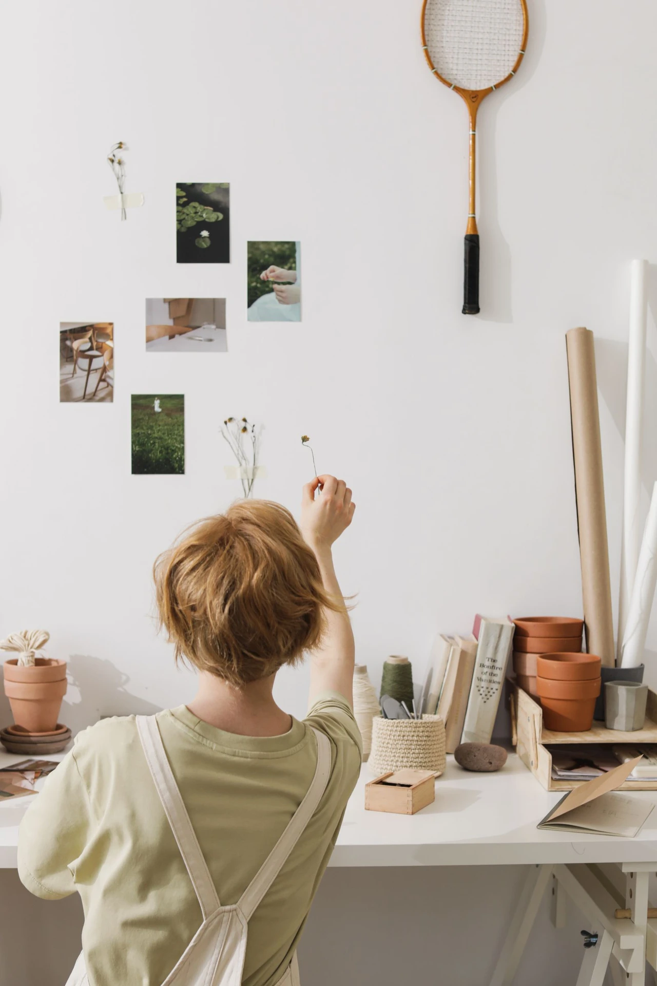 Hang a Gallery Wall With Adhesive Strips in a small apartment
