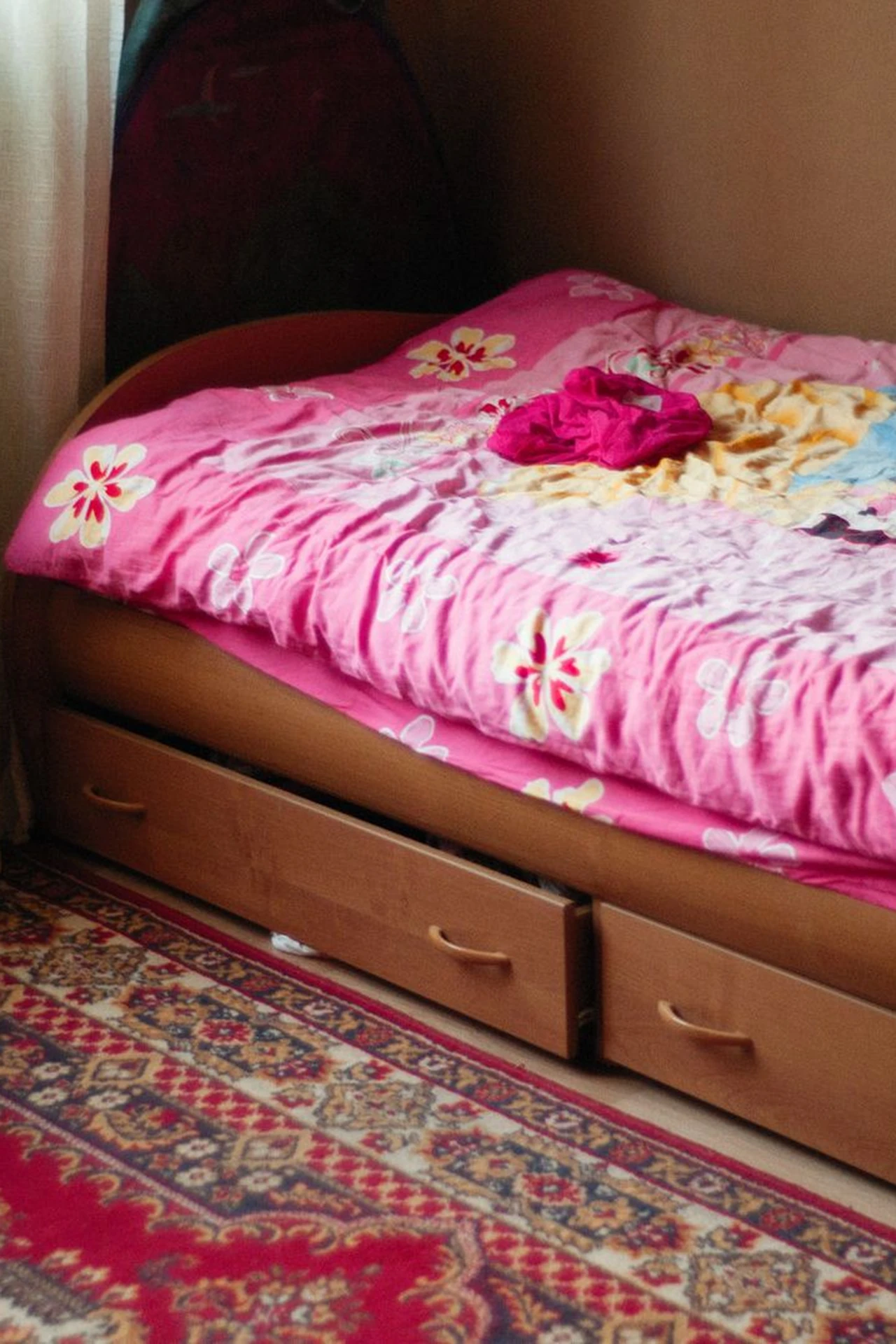 Slide Bins Under the Bed in a small apartment