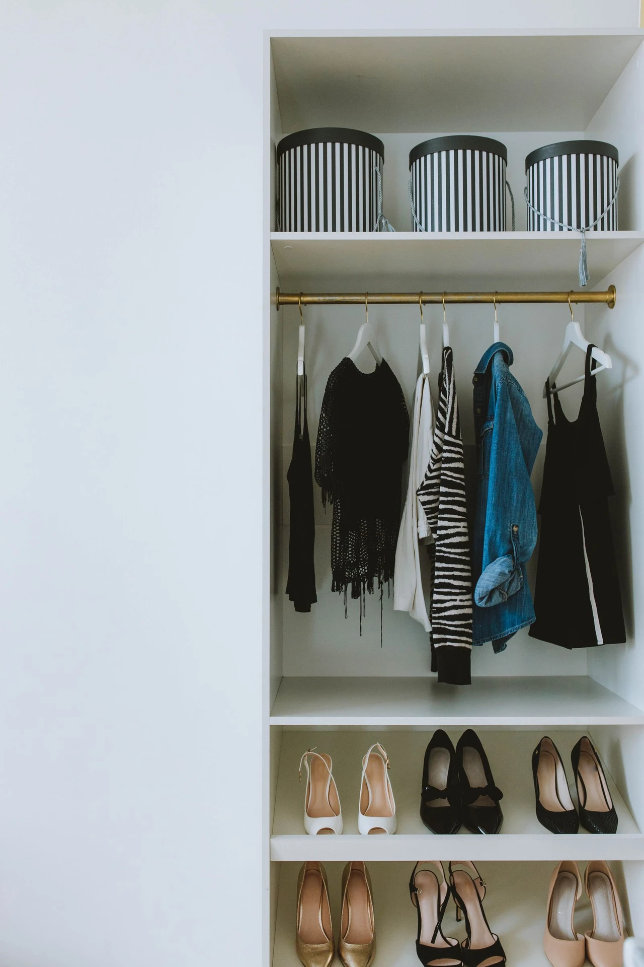 Hang a Shoe Organizer Inside the Closet in a small apartment