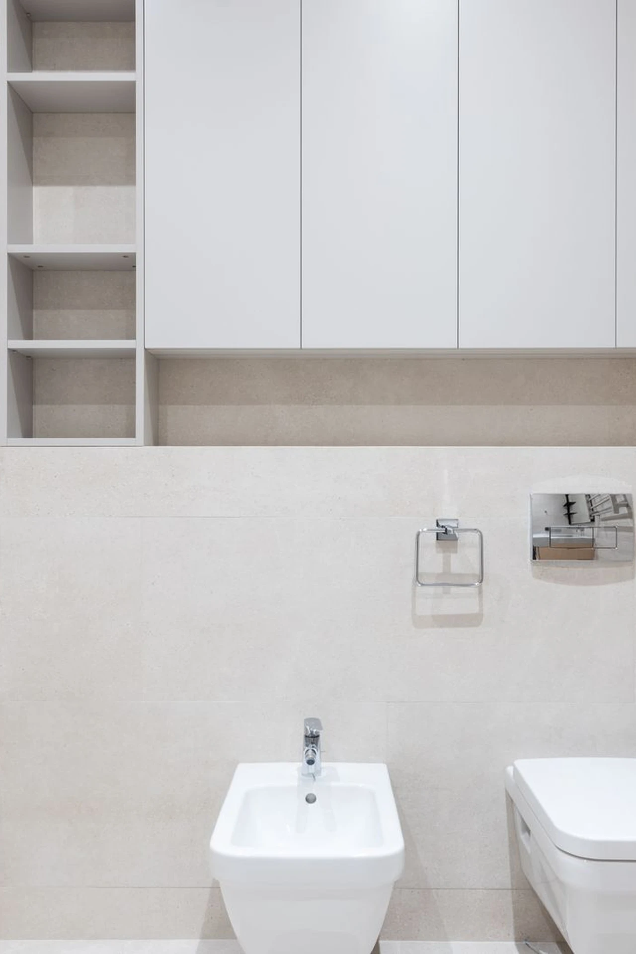 Add an Over-Toilet Shelf Unit in a small apartment