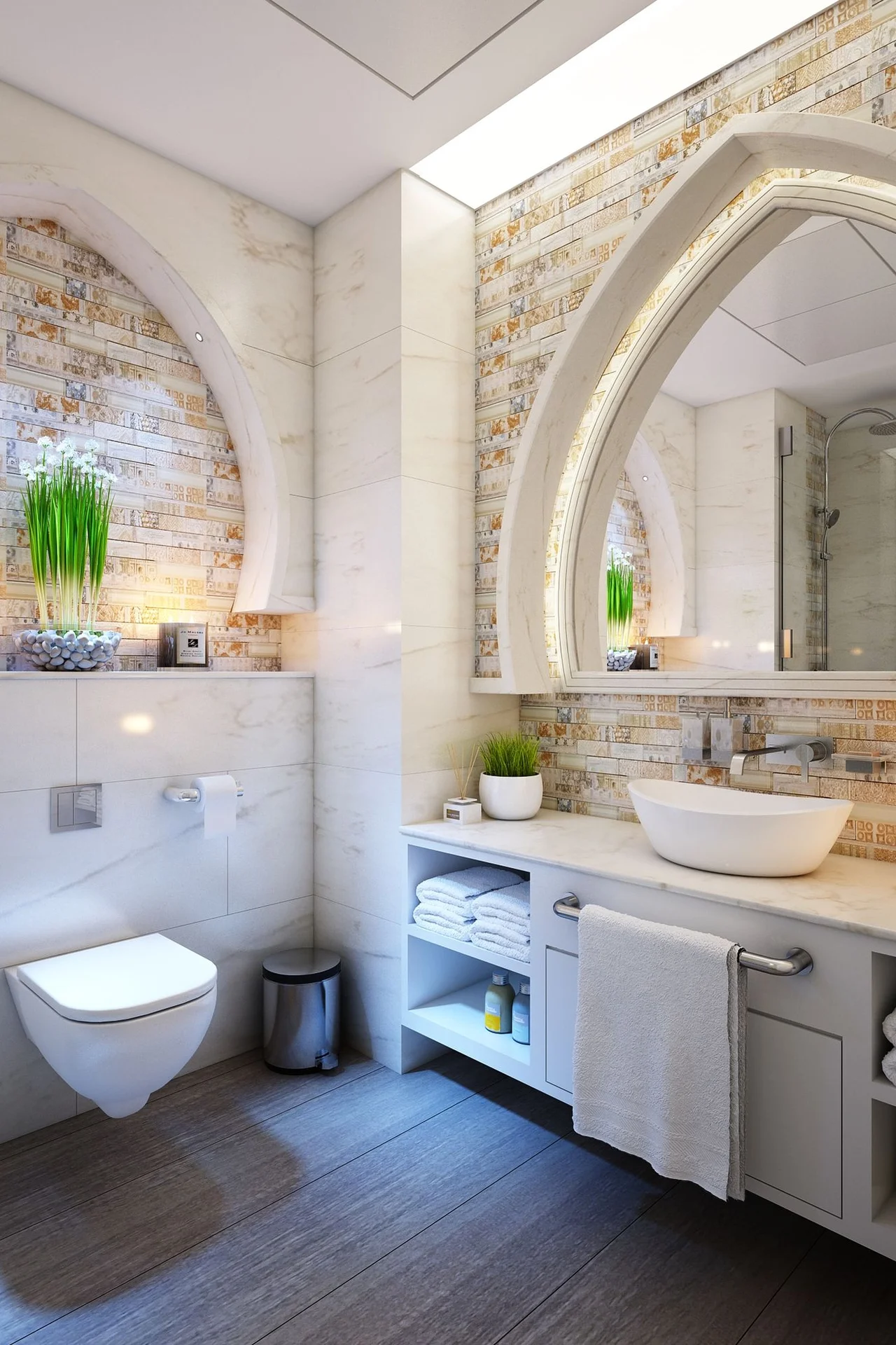 Use Adhesive Hooks for Towels and Robes in a small budget-friendly apartment