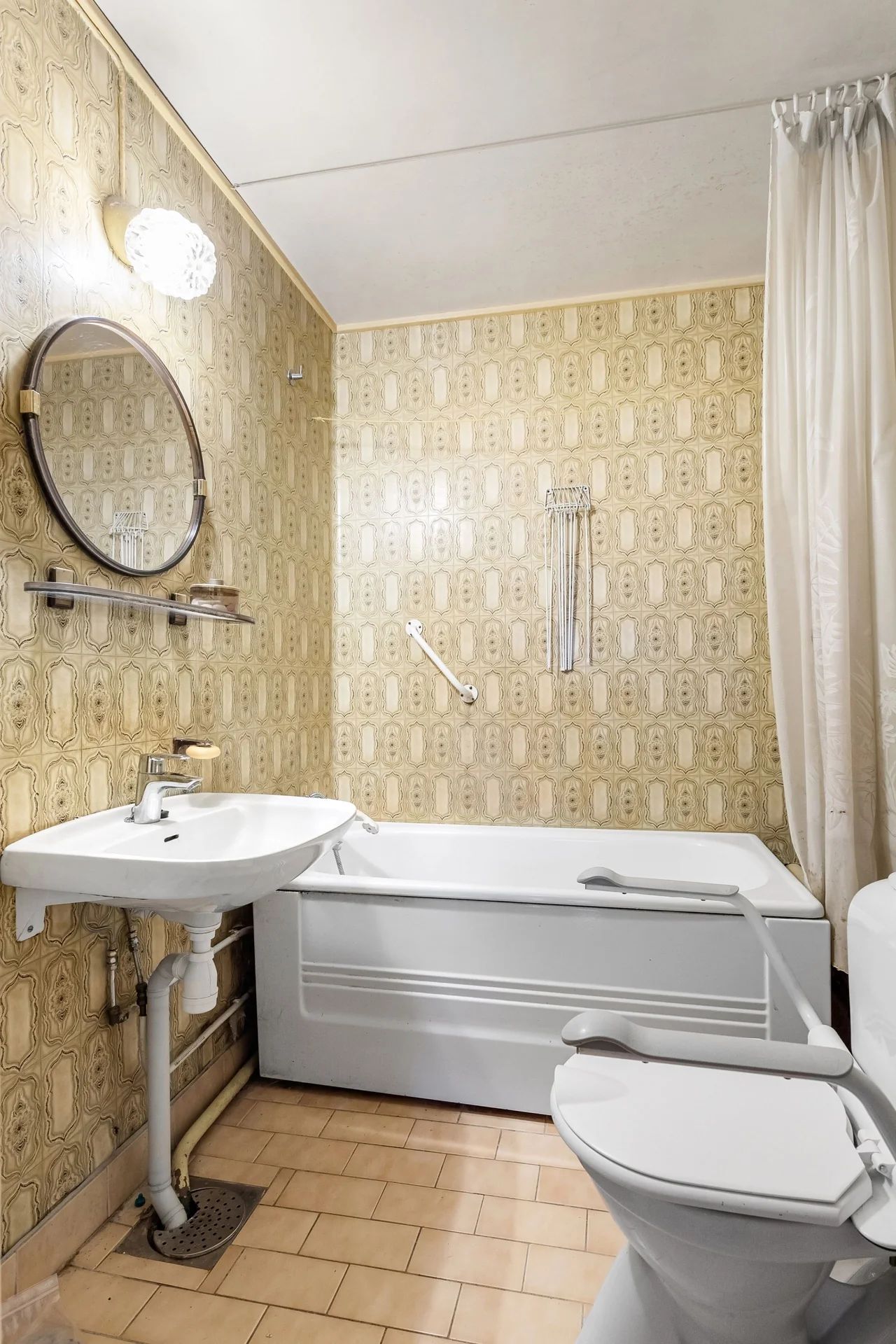 Try Removable Wallpaper on One Accent Wall in a small budget-friendly apartment