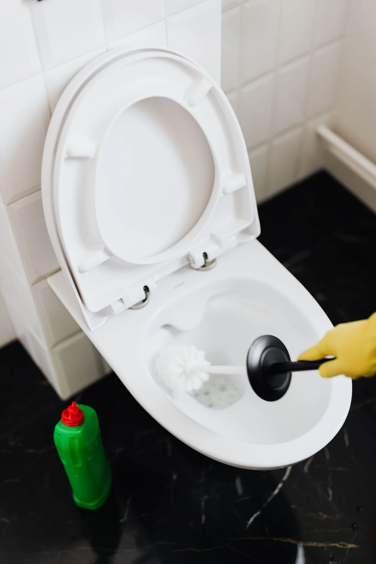 Keep a Small Cleaning Caddy Under the Sink in a small budget-friendly apartment